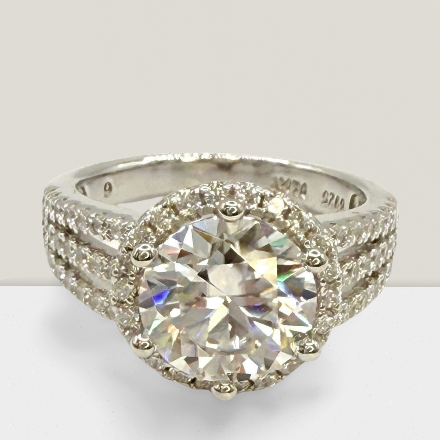 3 Carat Round cut Halo with Tri Band