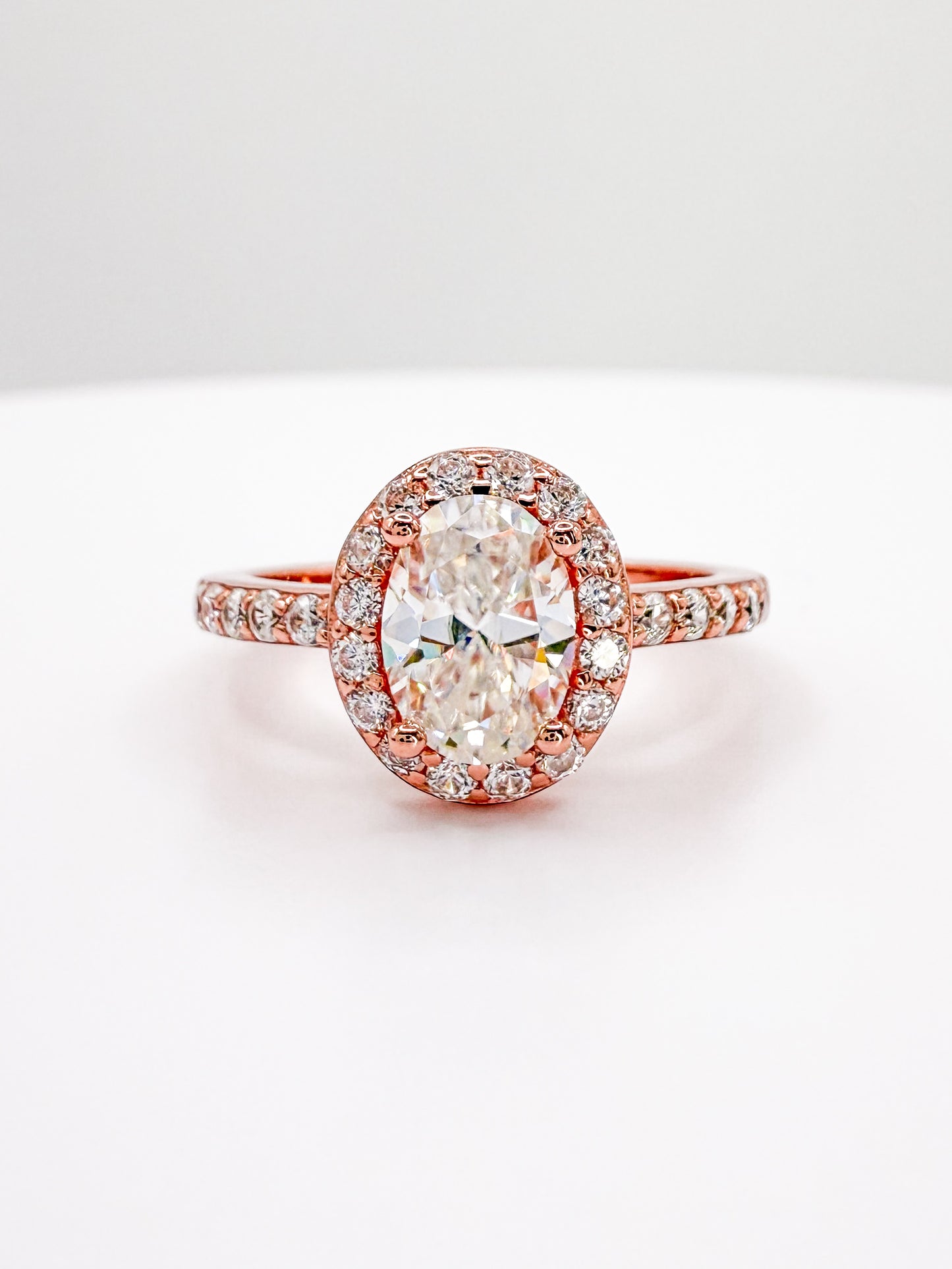 1 Carat Oval (Rose Gold) with halo and Side Pave Band